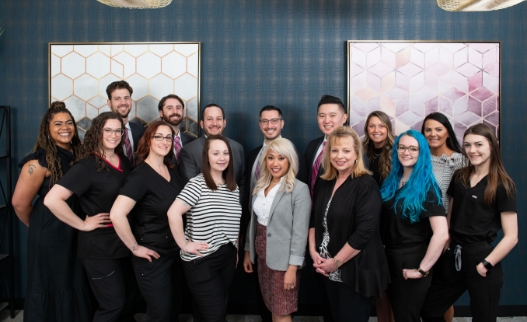 Smiling dental team at Dental Designs of Maryland