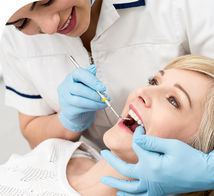 Woman receiving a preventive dentistry checkup in White Marsh